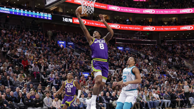Feb 22, 2024; Salt Lake City, Utah, USA; Utah Jazz forward Brice Sensabaugh (8) lays the ball up to the basket during the second quarter against the Charlotte Hornets at Delta Center.